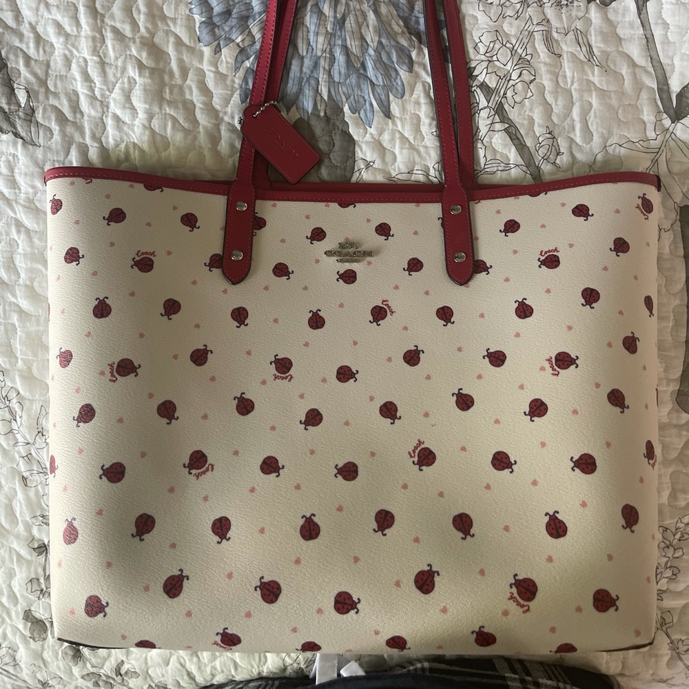 Coach ladybug reversible tote.